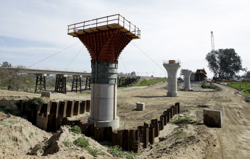 The supports for a 1,600-foot viaduct to carry high-speed rail trains across the Fresno River are seen under construction near Madera in February.
