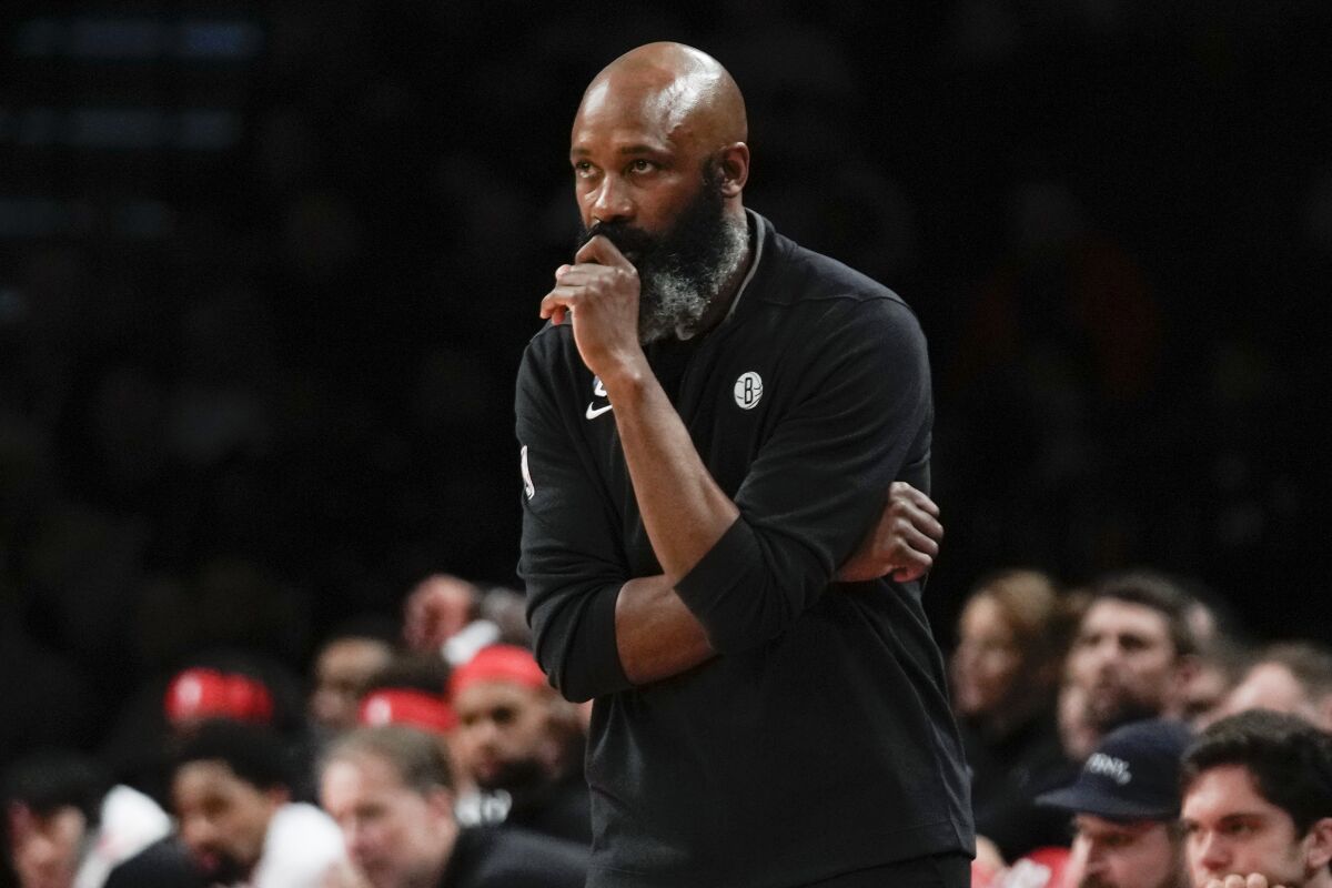 Brooklyn Nets head coach Jacque Vaughn watches during the first half of an NBA basketball game against the Denver Nuggets Sunday, March 19, 2023, in New York. (AP Photo/Seth Wenig)