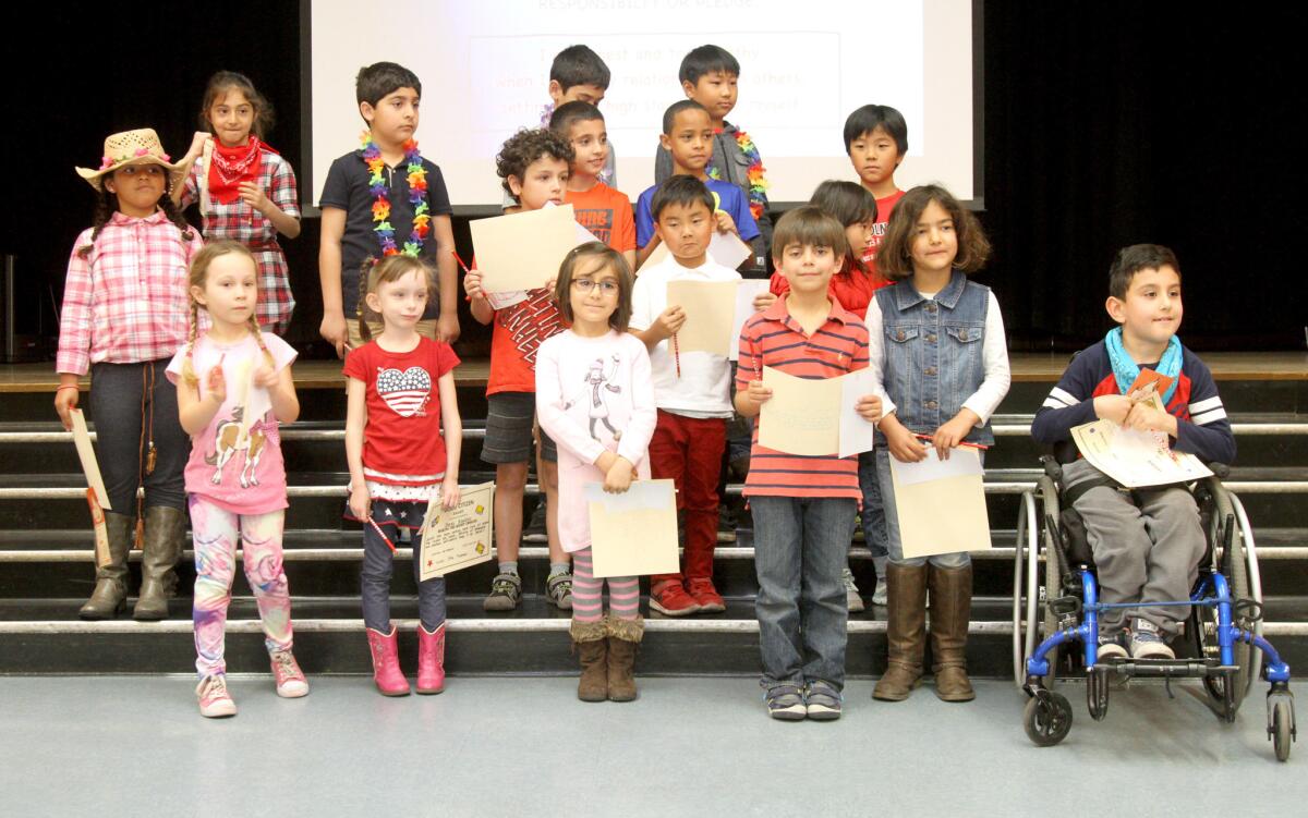 Seventeen Lincoln Elementary School kindergarten through third graders got the distinguished Honesty Trustworthyness Award for February during the flag ceremony at the school in La Crescenta on Friday, Feb. 26, 2016.