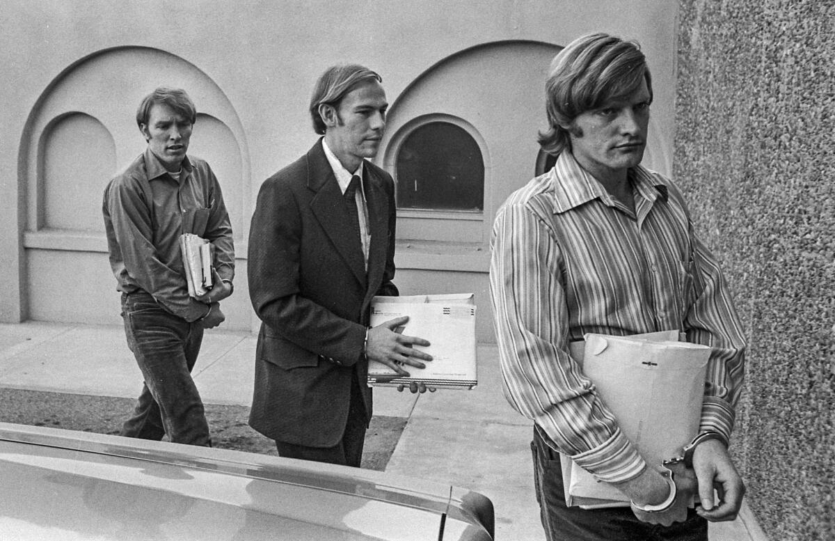 Oct. 19, 1976: Chowchilla bus kidnapping suspects from left, James Schoenfeld, Fred N. Woods and Richard Schoenfeld arrive for court session in Madera, Calif.