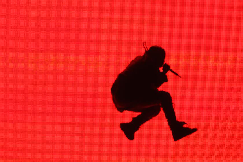 Kanye West performs at the Made in America festival in Los Angeles on Aug. 31, 2014