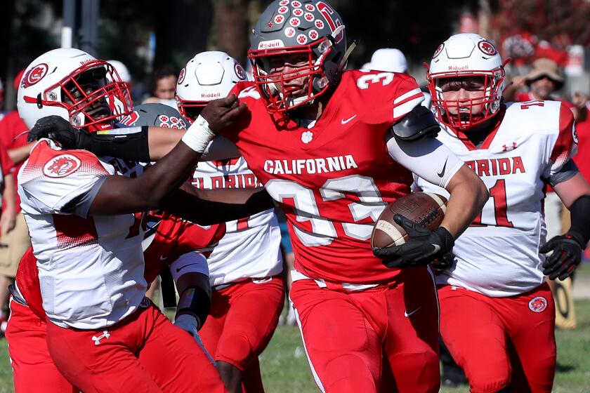RIVERSIDE, CALIF. - SEPT. 24, 2022. California School For The Deaf - Riverside running back Cody Metzner rumbles through the defense of the Florida School For The Deaf and Blind on Saturday, Sept. 24, 2022, in Riverside. The. Cubs won, 84-8, and kept their record perfect at 5-0. (Luis Sinco / Los Angeles Times)