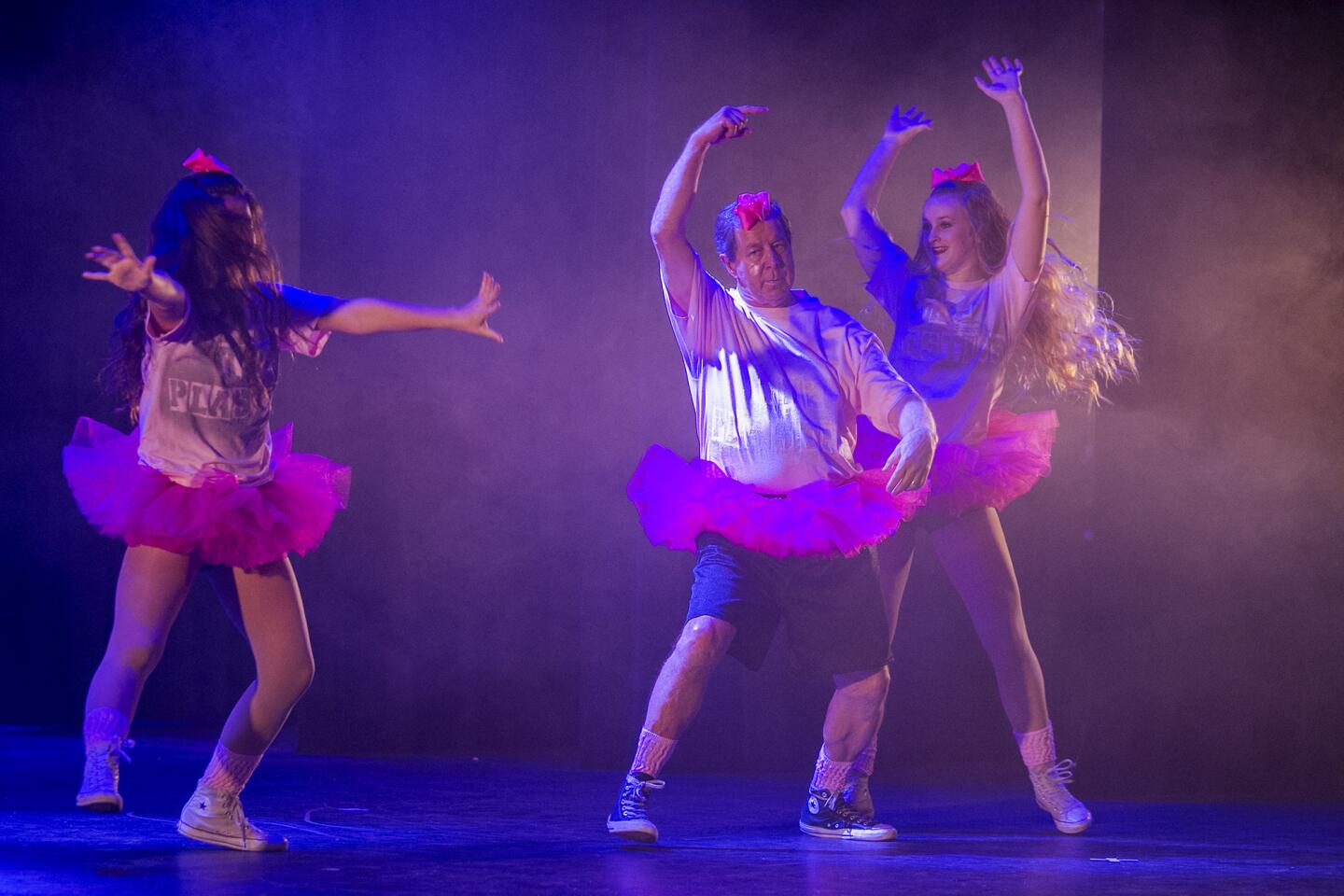 Team "The Plastics" with Caroiline Taketa, left, Robert Lear and Janie McDaniel perform.