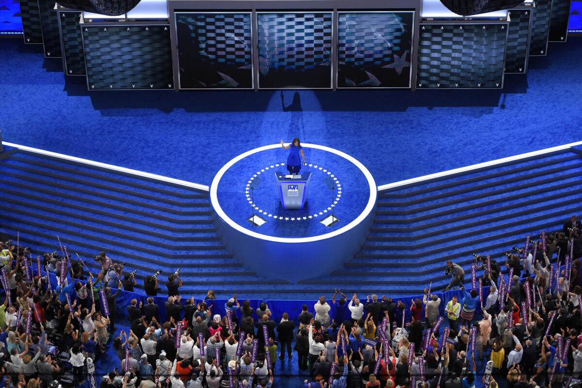 Michelle Obama, onstage at the Democratic National Convention in Philadelphia, before the basket-weave design that has become a theme of the political gathering.