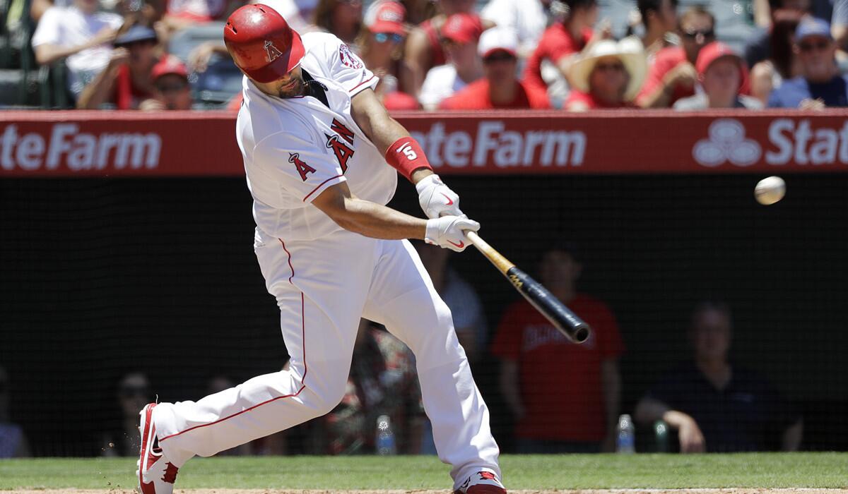 The Angels' Albert Pujols hits a two-run home run, his second of the game, during the fourth inning against the Chicago White Sox on July 17.