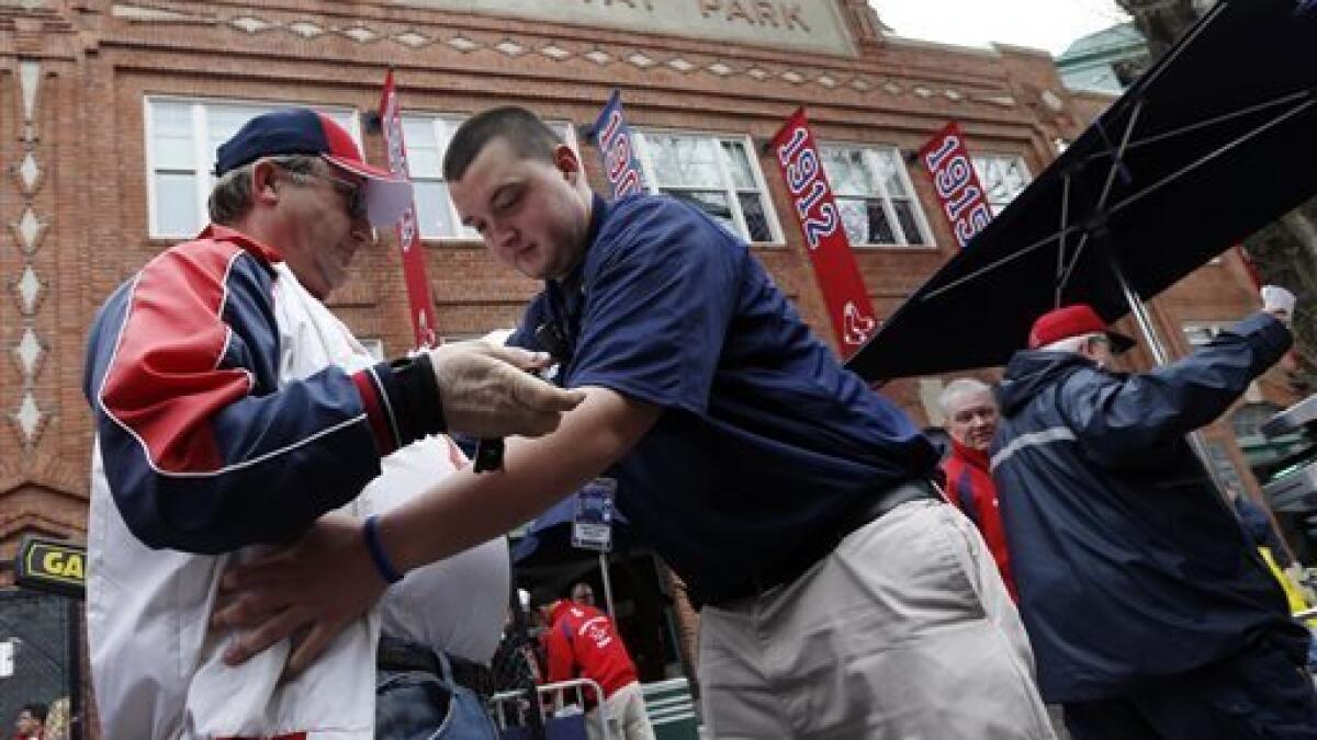 Red Sox and Bruins games postponed as manhunt for suspect in