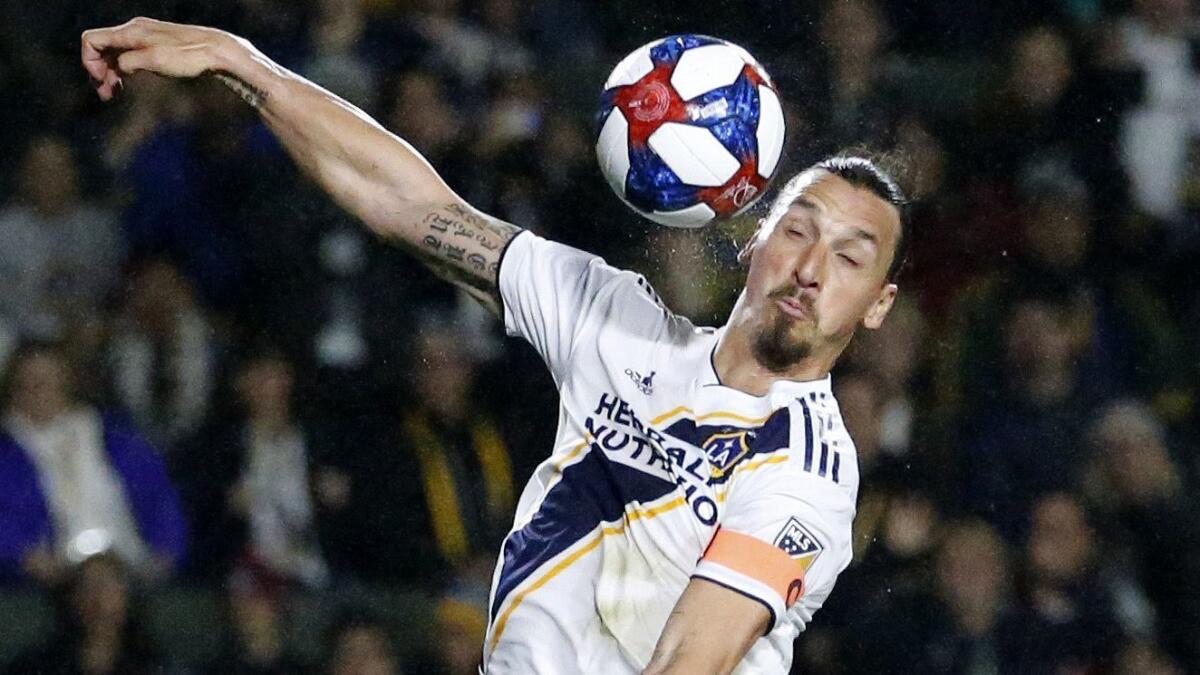 Galaxy forawrd Zlatan Ibrahimovic heads the ball during a game against Chicago on March 2.