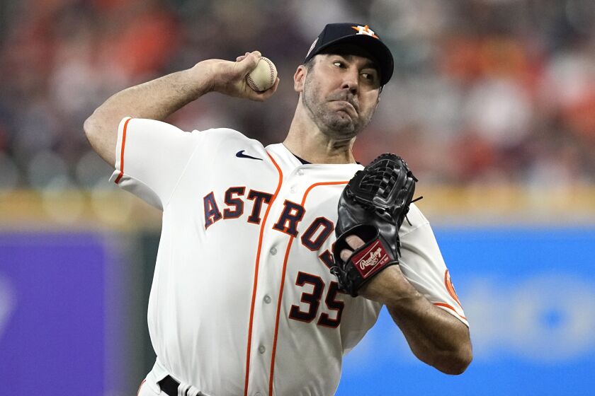 FILE - Houston Astros starting pitcher Justin Verlander throws to a Minnesota Twins batter.