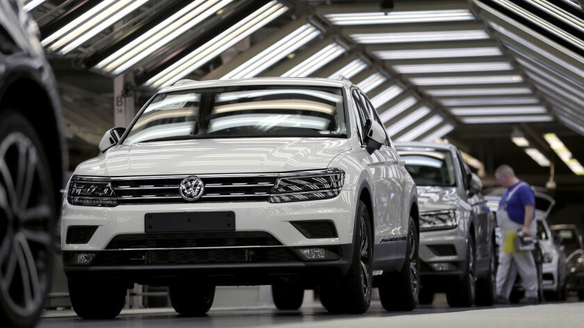 Volkswagen cars are pictured during a final quality control at the Volkswagen plant in Wolfsburg, Germany, in March.