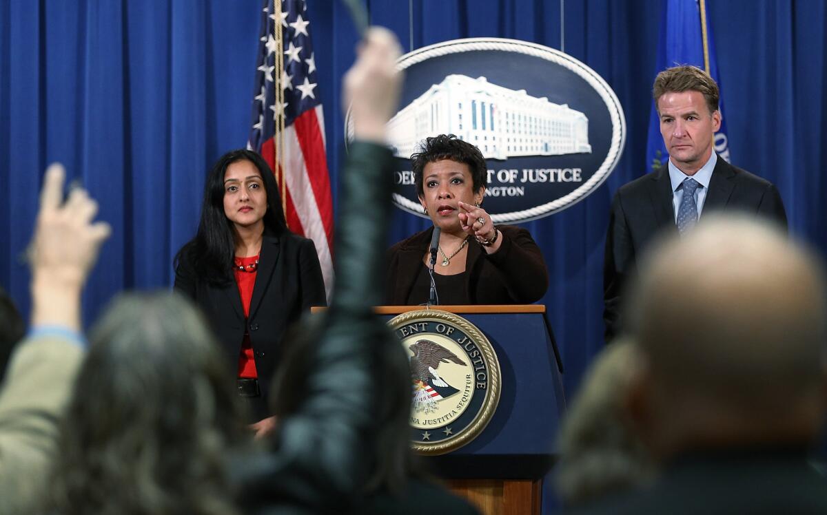 WASHINGTON, DC - DECEMBER 07: U.S. Attorney General Loretta Lynch (C) speaks during a press conference at the Department of Justice as Principal Deputy Assistant Attorney General Vanita Gupta (L), head of the Civil Rights Division and U.S. Attorney Zachary T. Fardon (R) of the Northern District of Illinois looks on December 7, 2015 in Washington, DC. Lynch announced a Justice Department investigation into the practices of the Chicago Police Department during the press conference. (Photo by Win McNamee/Getty Images) ** OUTS - ELSENT, FPG, CM - OUTS * NM, PH, VA if sourced by CT, LA or MoD **