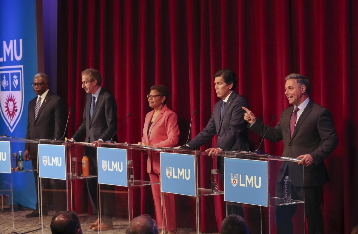 L.A. mayoral candidates stand onstage in last month's debate.