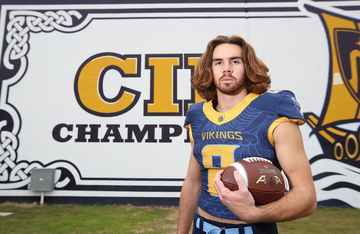 Dane Brenton caught a touchdown pass and intercepted two passes in Marina's 18-9 win over Muir in the CIF Southern Section Division 11 title game on Nov. 29.