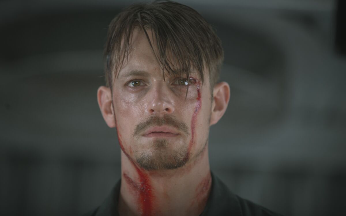 Snitches, indeed, get stitches: Joel Kinnaman plays a good man in a bad situation in "The Informer."