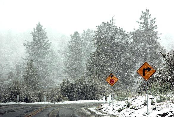 Snow falls in Wrightwood as unusual May storms swirl through Southern California.