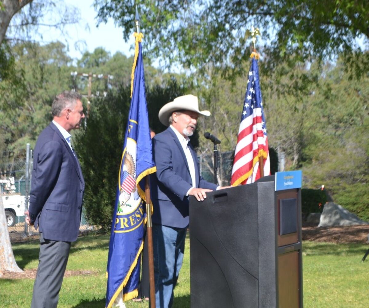 Mayor Steve Vaus, with Rep. Scott Peters, D-San Diego, speaks during a news conference on the Poway water treatment plant.