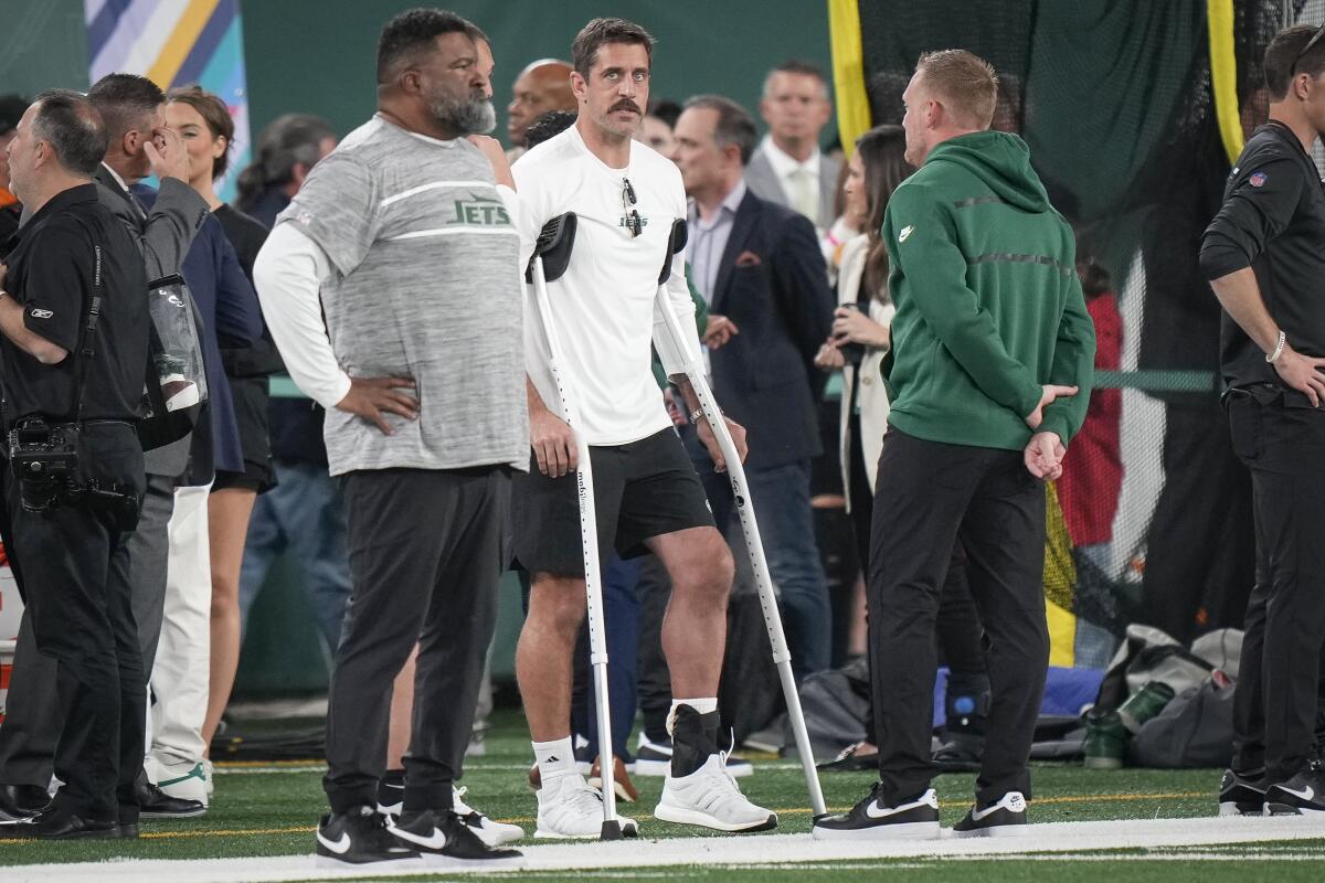 Jets lose Aaron Rodgers to an Achilles tendon injury, then rally