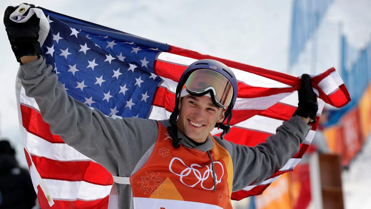 Silver medal winner Nick Goepper, of the United States, celebrates after the men's slopestyle final at Phoenix Snow Park.