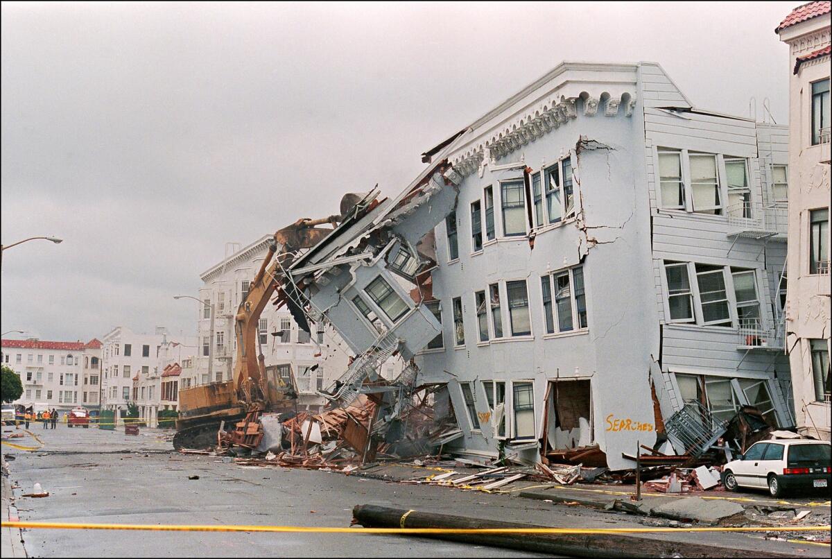 The front of an apartment building in the Marina District in San Francisco collapsed in the 1989 Loma Prieta earthquake.