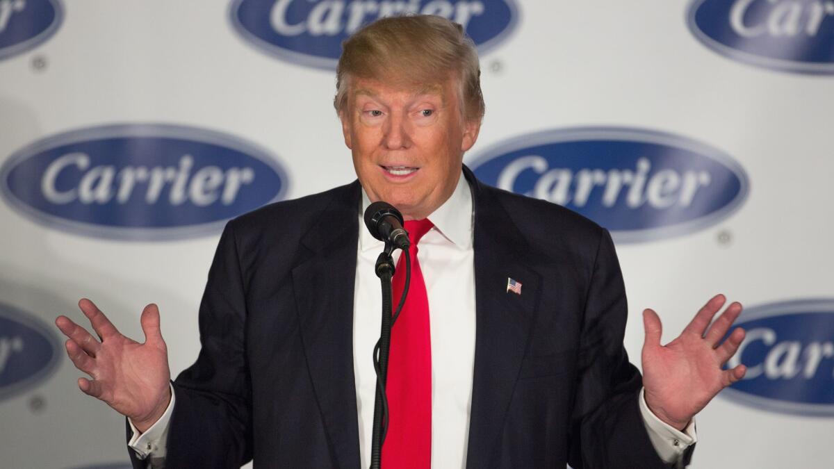 President-elect Donald Trump speaks to workers Thursday at a Carrier plant in Indianapolis.