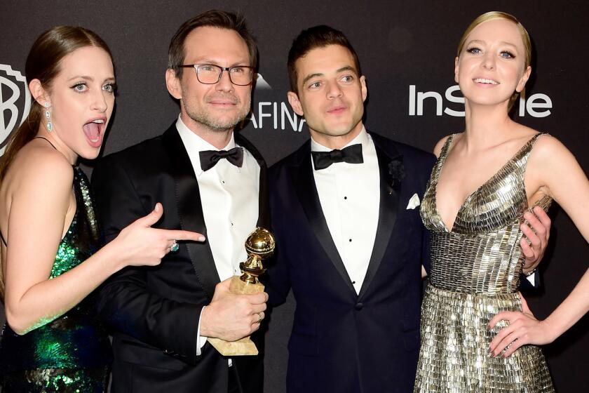 "Mr. Robot" actors Carly Chaikin, left, Christian Slater, Rami Malek and Portia Doubleday celebrate their show's television drama victory, and Slater's supporting actor win, at the InStyle / Warner Bros. Golden Globes after party.