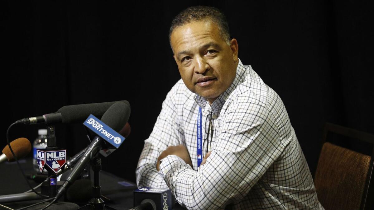Dodgers manager Dave Roberts speaks at a news conference during Major League Baseball winter meetings.