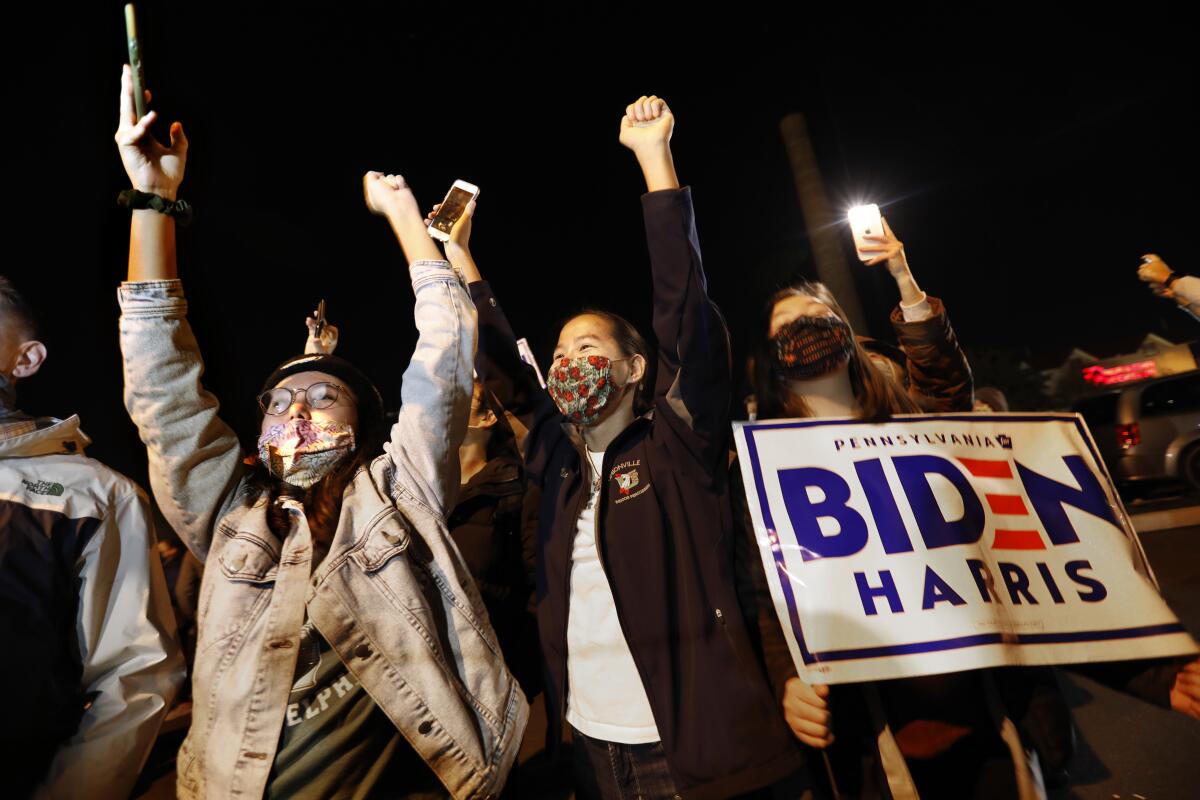 Supporters cheer as the Biden motorcade arrives at Chase Center in Wilmington, Del., on Thursday.