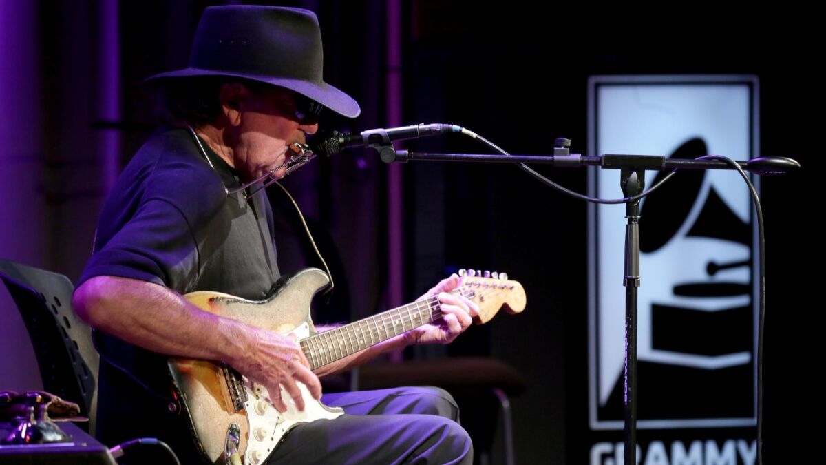Singer-songwriter Tony Joe White photographed during a 2016 performance at the Grammy Museum in Los Angeles