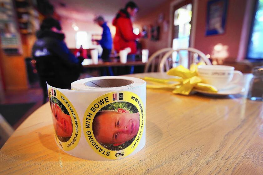 A roll of stickers showing support for Army Sgt. Bowe Bergdahl sits on a table at Zaney's coffeehouse in Bergdahl's hometown of Hailey, Idaho. Bergdahl, who was released Saturday after being held prisoner in Afghanistan for five years, used to work at the coffeehouse.
