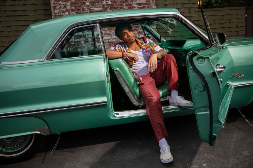 LOS ANGELES, CA --APRIL 03, 2019 --Anderson .Paak, the R&B singer-rapper-drummer-producer that broke out as protege of Dr. Dre, is photographed with his '63 Impala, outside his Los Angeles, CA, studio, April 03, 2019. The genre-stretching musician will be returning to Coachella, on the heels of an album release. (Jay L. Clendenin / Los Angeles Times)