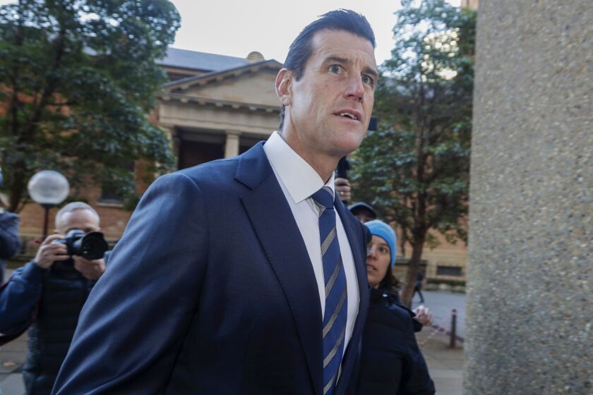 FILE - Ben Roberts-Smith arrives at the Federal Court in Sydney, on June 9, 2021. Australia’s most decorated living war veteran, Victoria Cross recipient Ben Roberts-Smith, committed a slew of war crimes while in Afghanistan including the unlawful killings of unarmed prisoners, a judge ruled on Thursday, June 1, 2023. (AP Photo/Rick Rycroft, File)