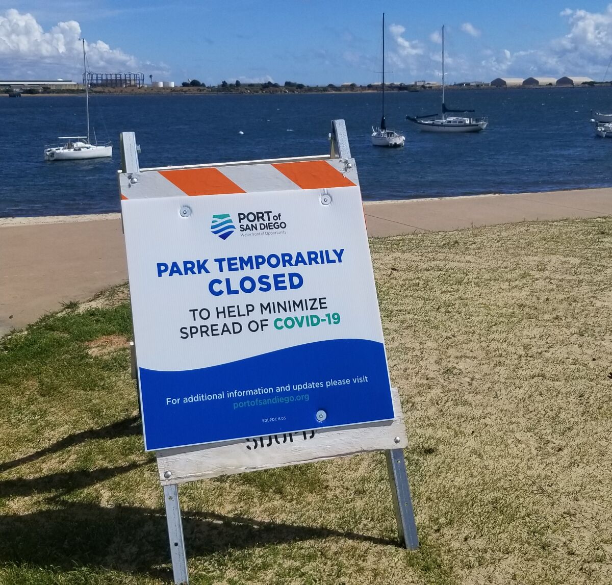 A sign at Shelter Island Shoreline Park informs visitors that the park is temporarily closed due to coronavirus (COVID-19).