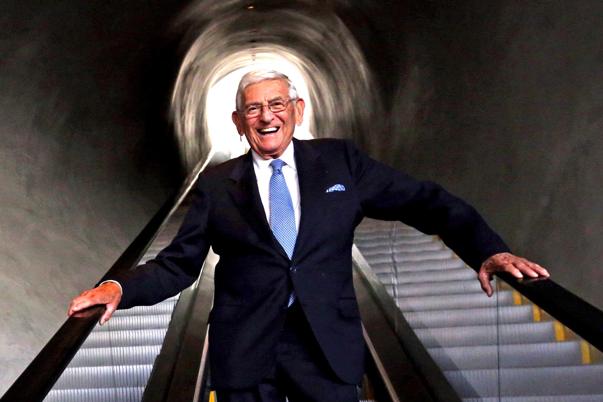 Eli Broad stands inside the Broad museum. 