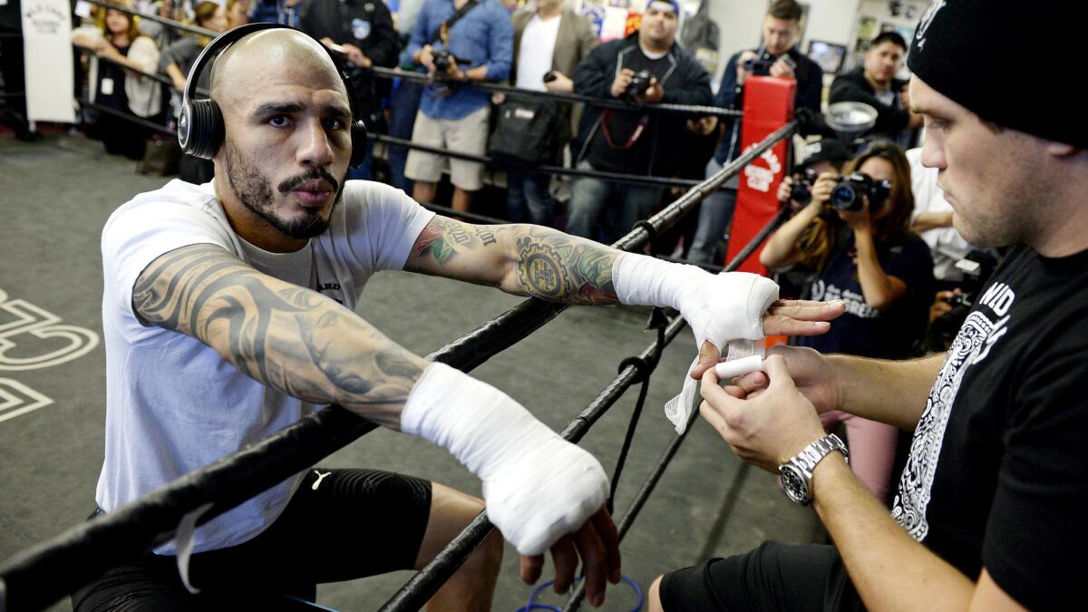 Miguel Cotto has his hands wrapped before a workout open to the media at Wild Card Boxing Club on Nov. 4.