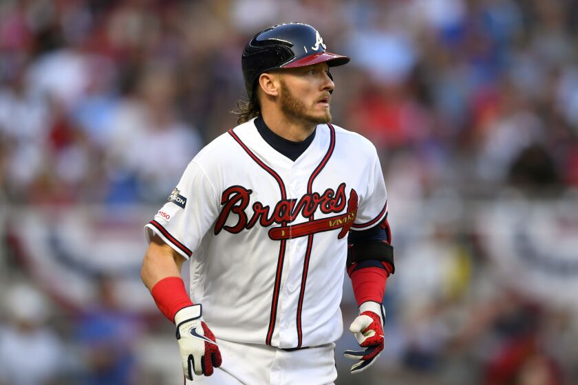 Atlanta Braves' Josh Donaldson hits a home run during the fourth inning of Game 5 of their National League Division Series baseball game against the St. Louis Cardinals, Wednesday, Oct. 9, 2019, in Atlanta. (AP Photo/John Amis)