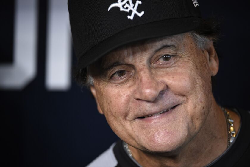 FILE - Chicago White Sox manager Tony La Russa smiles before Game 2 of a baseball American League Division Series against the Houston Astros, Oct. 8, 2021, in Houston. La Russa has stepped down as manager of the White Sox because of a heart issue. The announcement Monday, Oct. 3, 2022, ends a disappointing two-year run in the same spot where the Hall of Famer got his first job as a big league skipper. (AP Photo/Eric Christian Smith, File)