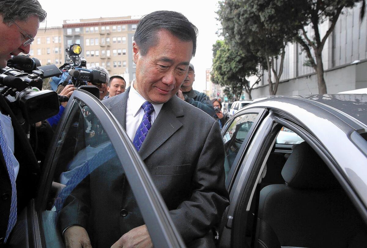 State Sen. Leland Yee leaves the Federal Building in San Francisco after a court appearance. Yee was arrested by FBI agents last week on charges of criminal corruption and conspiring to illegally traffic firearms.