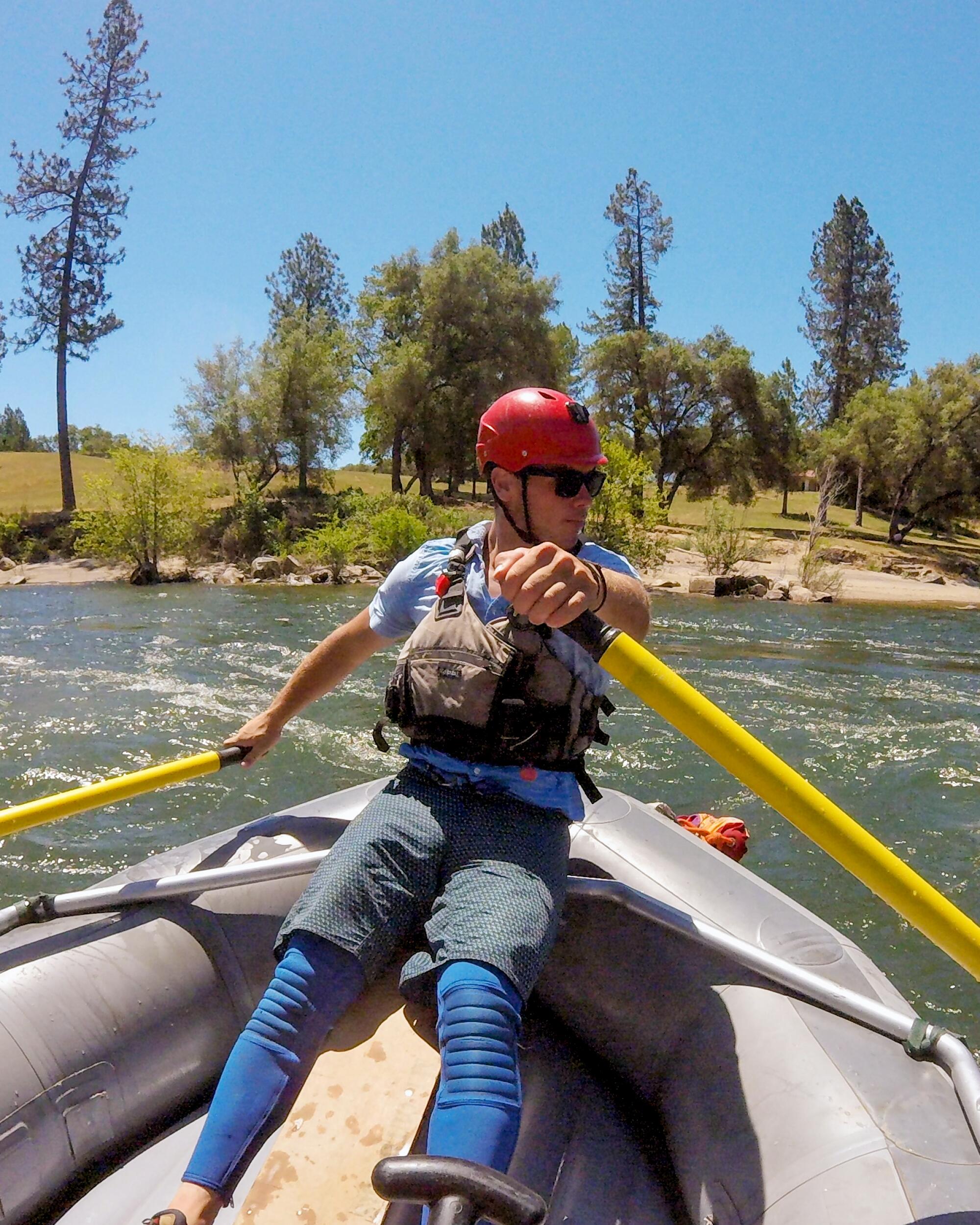 River usher Kyle Brazil navigates the American River, adjacent Coloma, successful a dinghy.