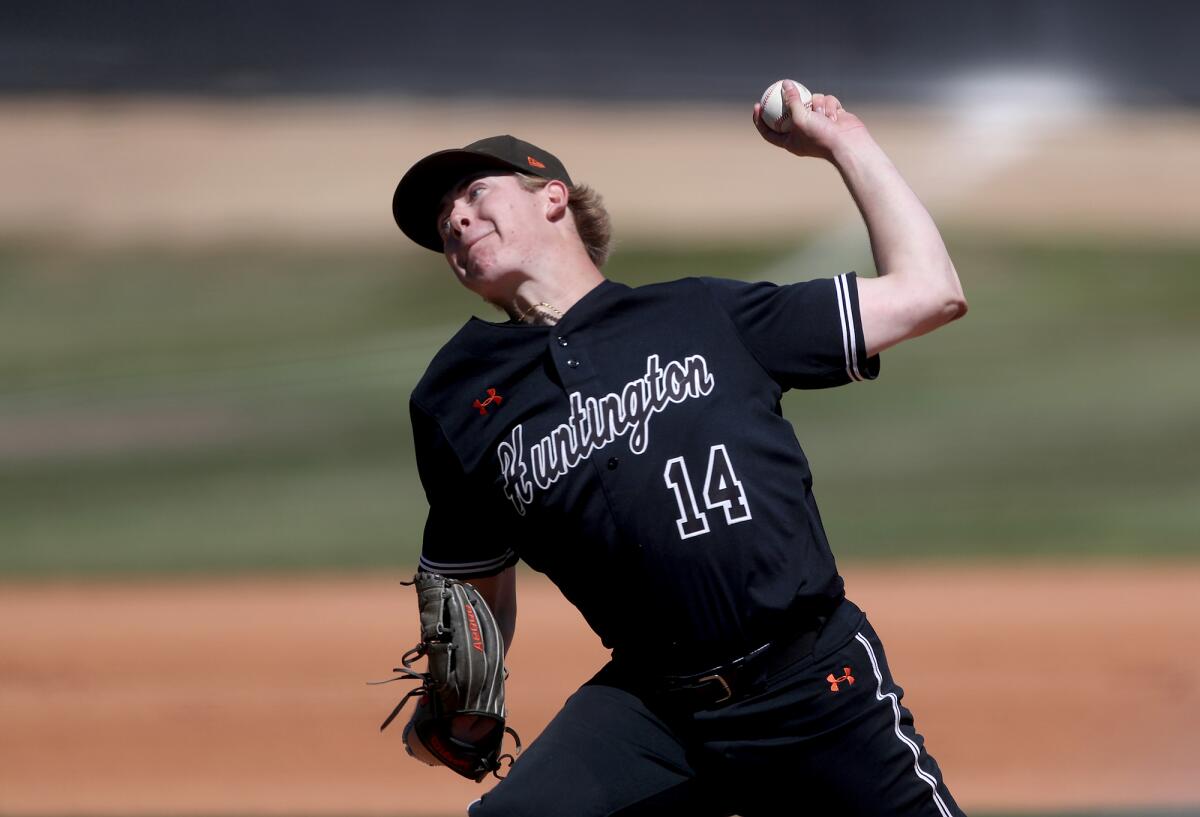 Pitcher Ben Jacobs of Huntington Beach throws in the first inning against Bishop Amat on Tuesday.