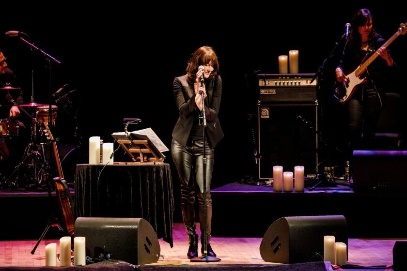 LOS ANGELES, CALIF. -- WEDNESDAY, FEBRUARY 21, 2018: Carla Bruni performs at the Orpheum Theatre in Los Angeles, Calif., on Feb. 21, 2018. (Marcus Yam / Los Angeles Times)