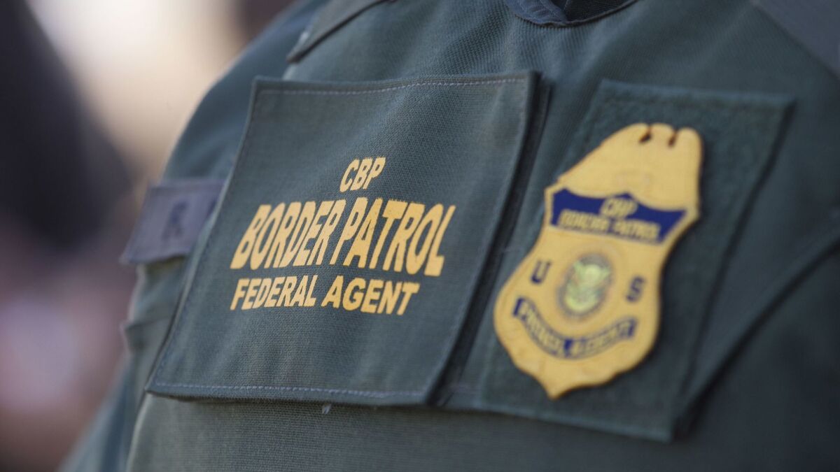 A Border Patrol agent was arrested Sunday on suspicion of possessing heroin and an illegal gun by Oceanside police officers.