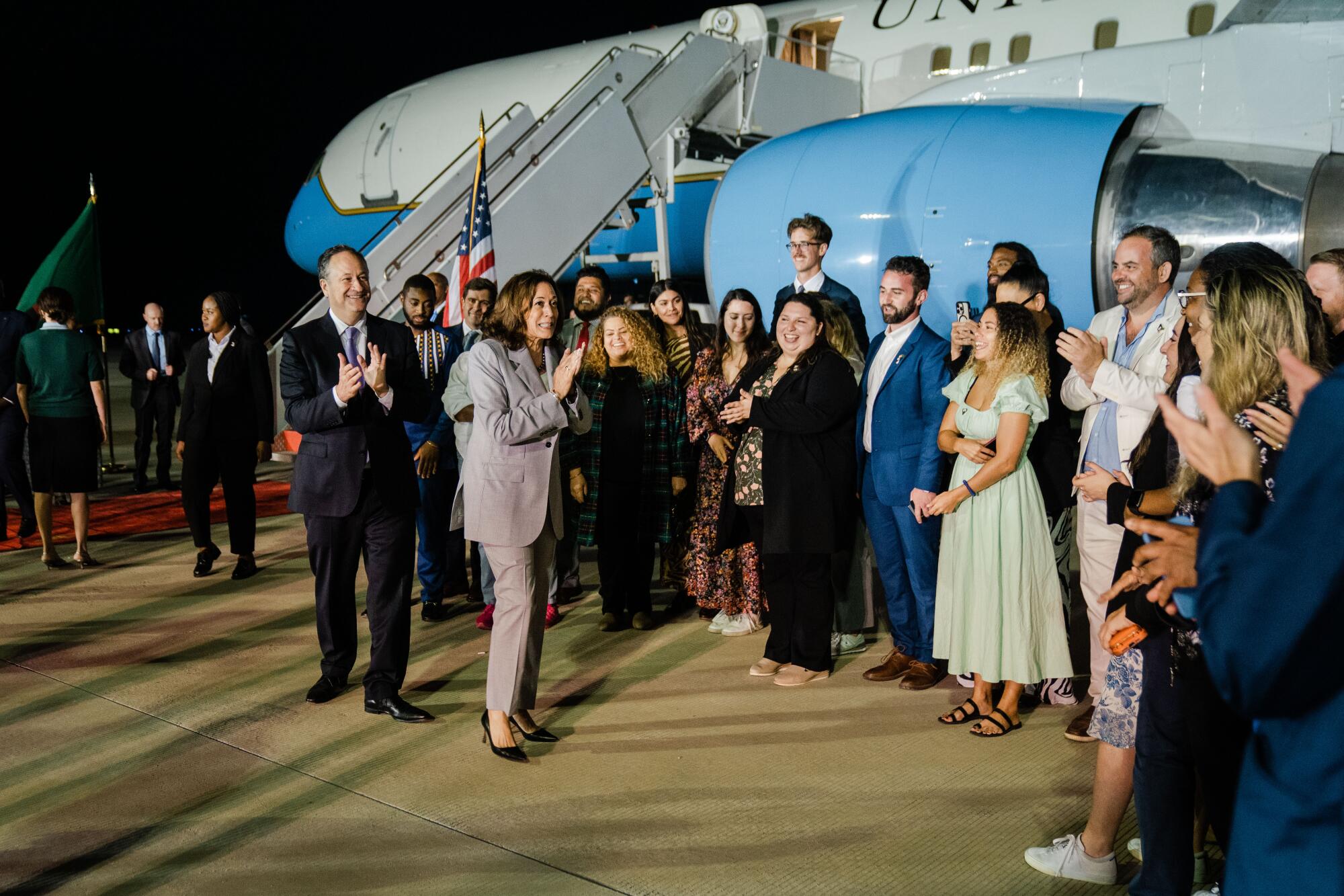 Vice President Kamala Harris and Second Gentleman Doug Emhoff thank White House advance staffers