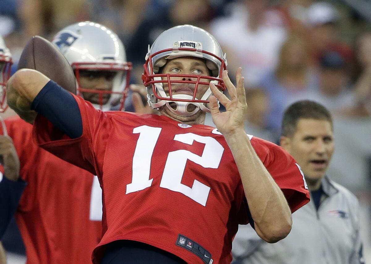 Tom Brady practices with the New England Patriots on Aug. 1.