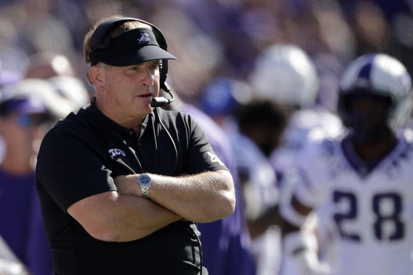 TCU coach Gary Patterson stands on the sideline and watches his team play against Kansas State in 2019.