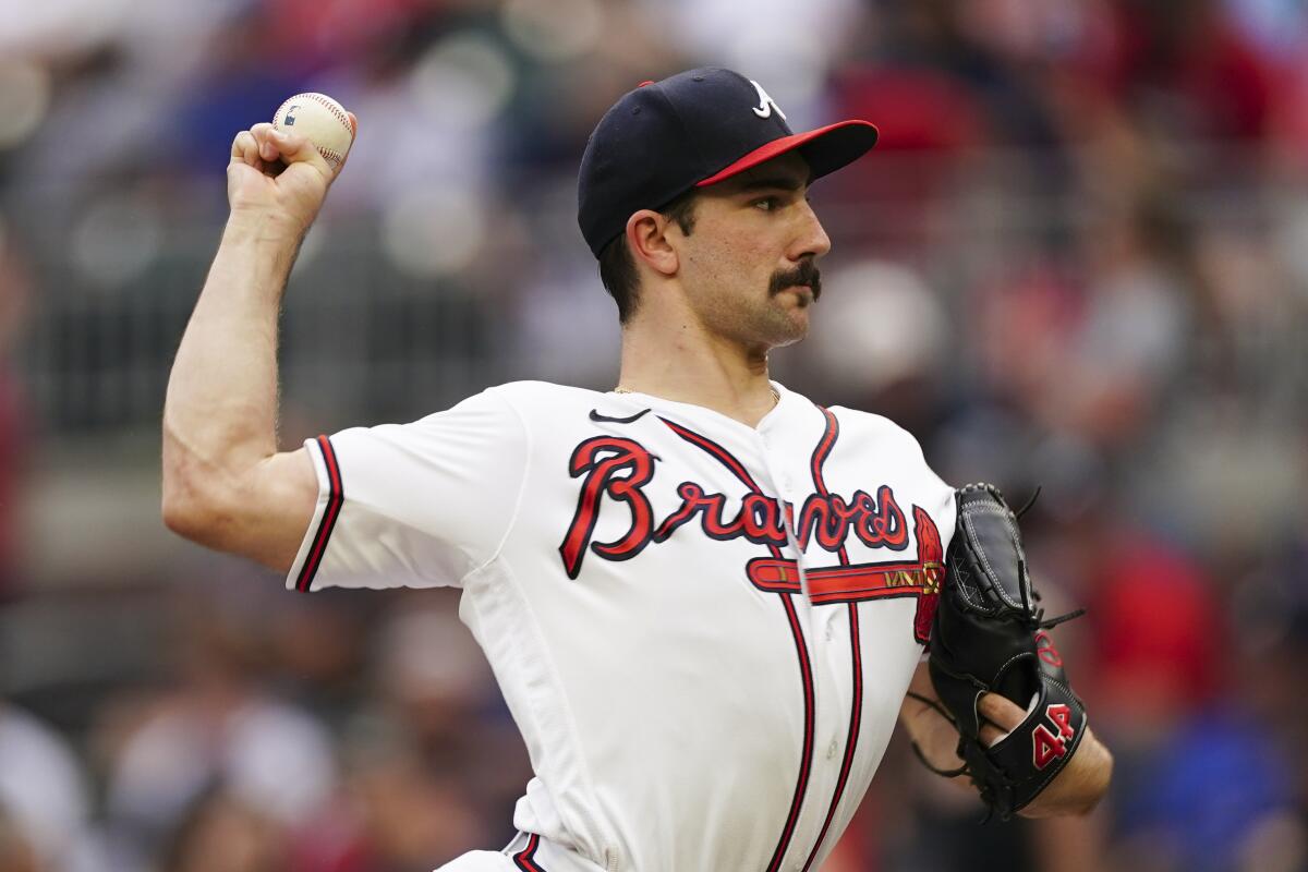Atlanta Braves starting pitcher Spencer Strider works against the St. Louis Cardinals during the first inning of a baseball game Thursday, July 7, 2022, in Atlanta. (AP Photo/John Bazemore)