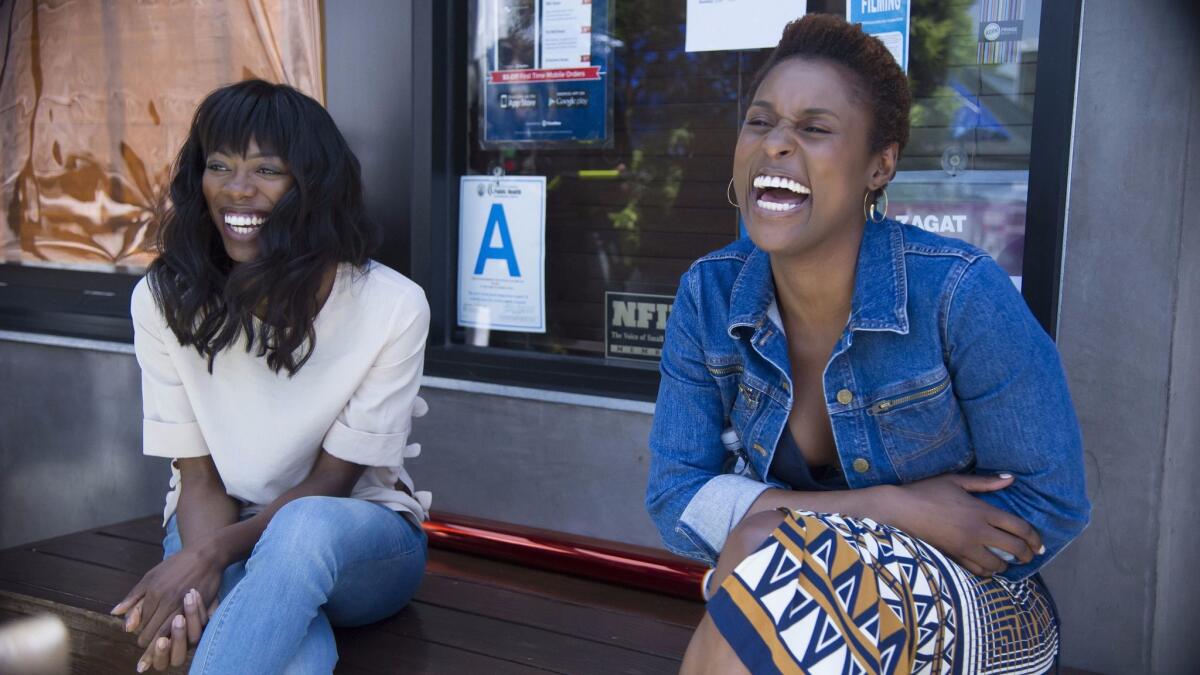 Yvonne Orji, left, with Issa Rae on "Insecure." (Anne Marie Fox / HBO)