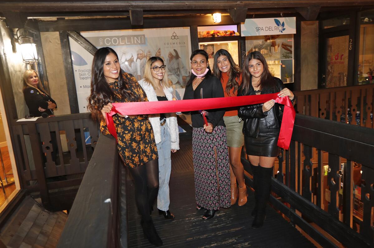 Lesli, Nicole, Claudia (mom) Perla, and Michelle Del Rio officially cut the ribbon on their new Spa Del Rio location.