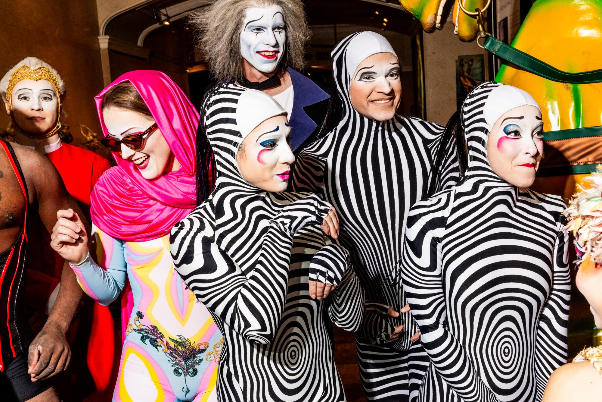 Cast members dressed as zebras walk in the parade celebrating the 25th anniversary of Cirque du Soleil's "O."