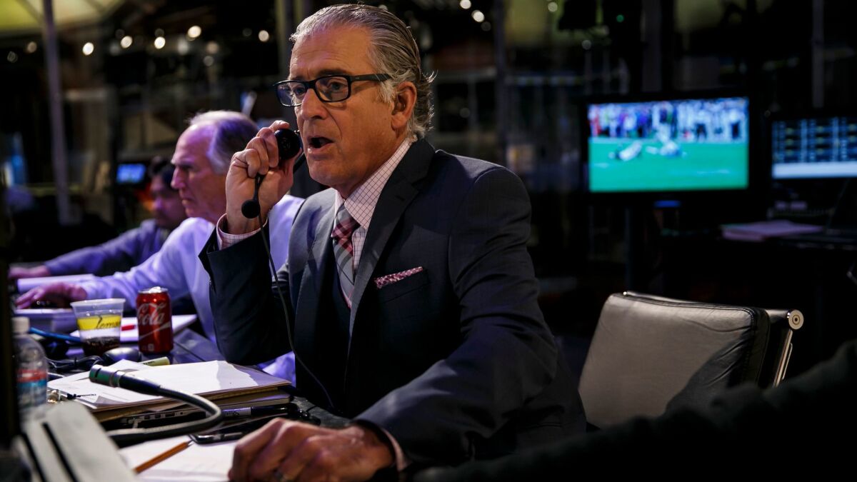 Mike Pereira, working last season inside the 'officiating command center' at Fox studios in Los Angeles.