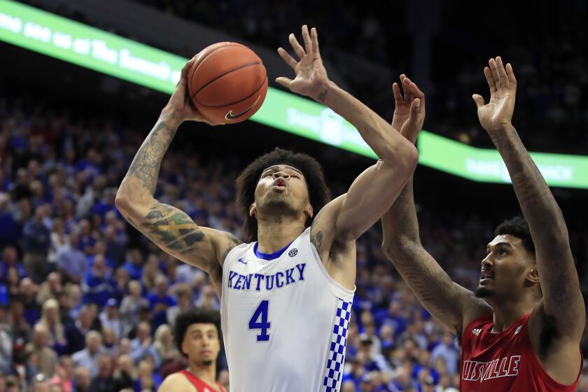LEXINGTON, KENTUCKY - DECEMBER 28: Nick Richards #4 of the Kentucky Wildcats shoots the ball against the Louisville Cardinals at Rupp Arena on December 28, 2019 in Lexington, Kentucky. (Photo by Andy Lyons/Getty Images)