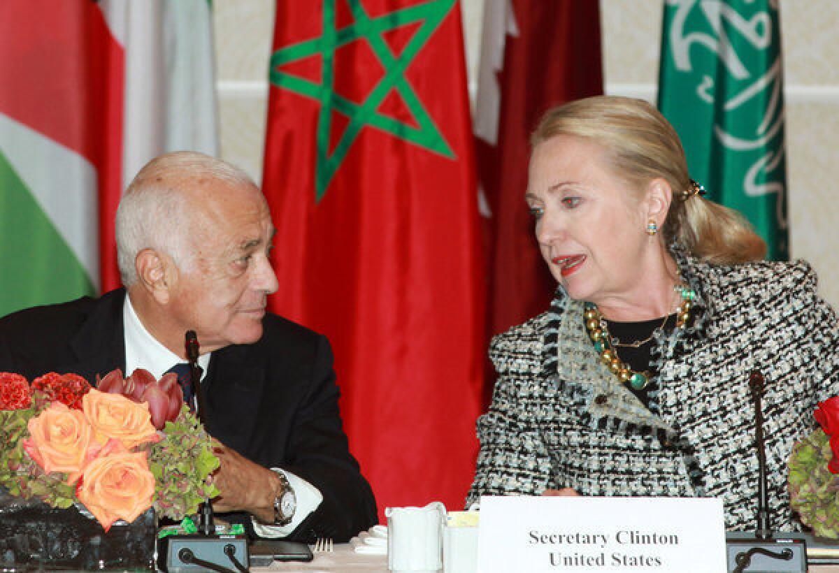 Secretary of State Hillary Rodham Clinton, right, welcomes Nabil Elaraby, head of the Arab League, as she hosts a gathering of Friends of Syria group on Sept. 28 in New York. Looking forward to this week's meeting of Syrian opposition figures in Qatar, Clinton said last week that the Syrian National Council, a group dominated by longtime exiles, "can no longer be viewed as the visible leader of the opposition," though it could be "part of a larger opposition."